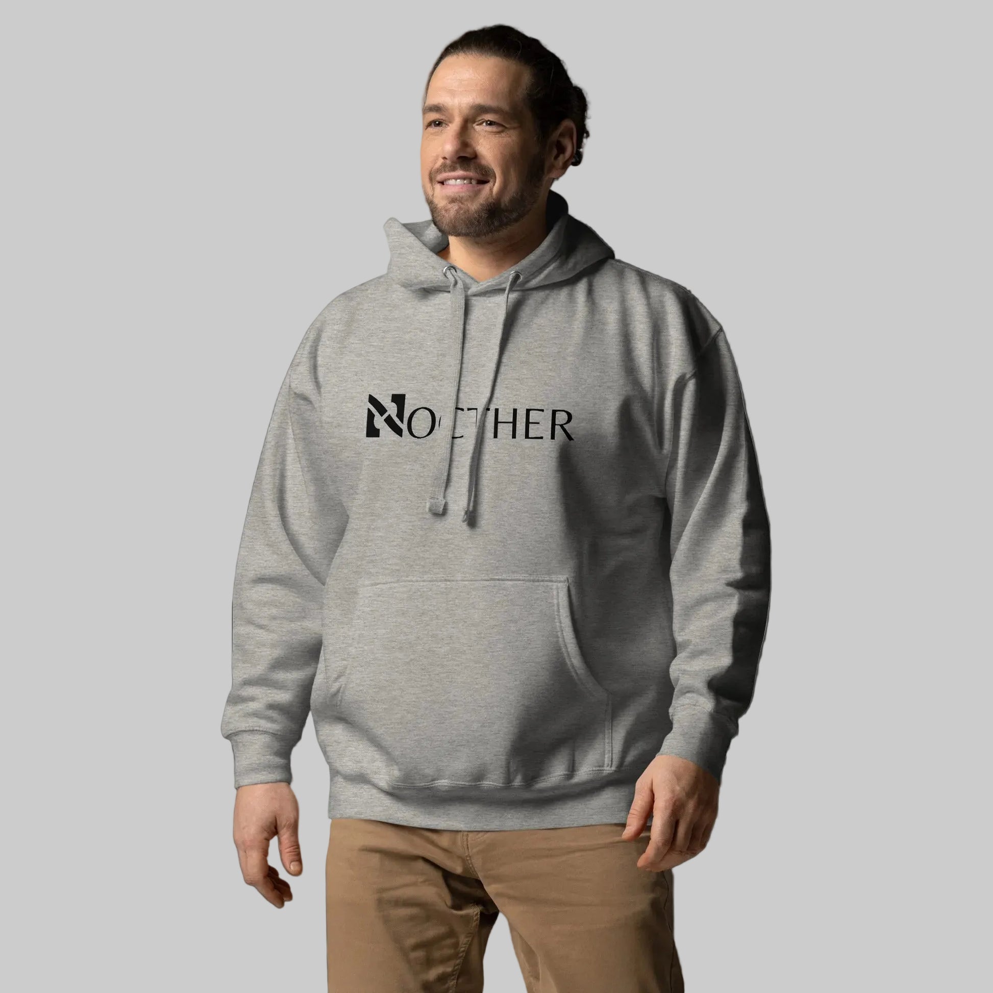 Man wearing a gray hoodie with 'No Other' logo on a dark background
